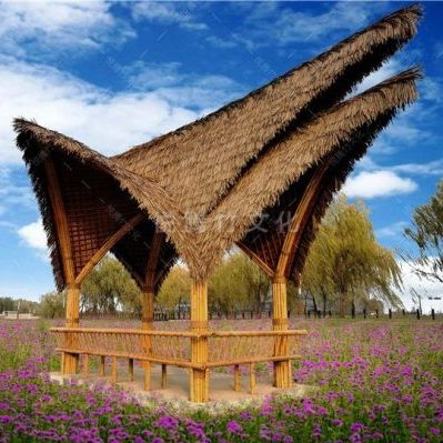 Carbonised bamboo pavilion with simulated thatch roof